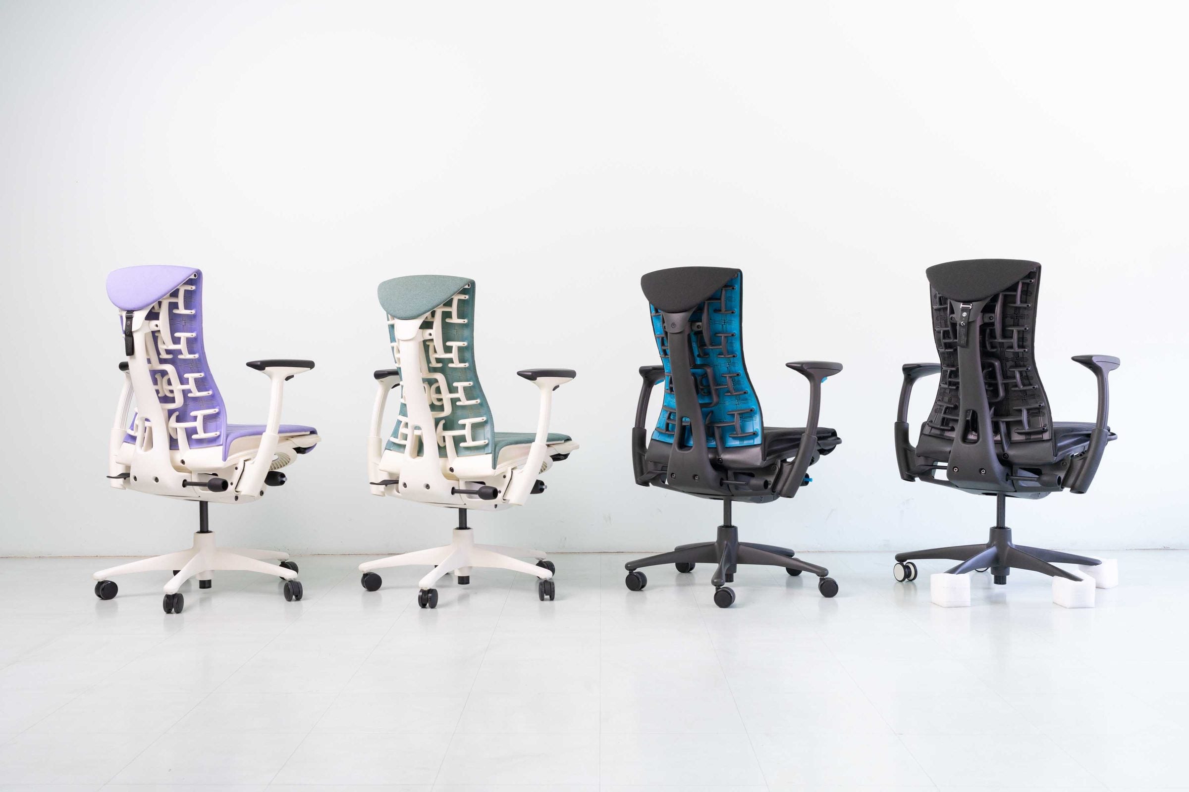 Four Embody chairs in a row seen from behind